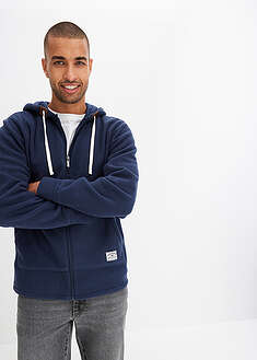 Fleecetakki hupulla ja päälleommelluilla taskuilla