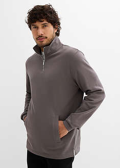 Collegepaita puhtaasta luomupuuvillasta. Suora helma ja edessä kätevät taskut