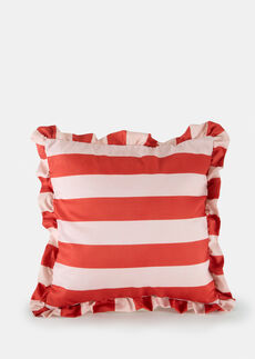 Raidallinen koristetyyny röyhelöillä